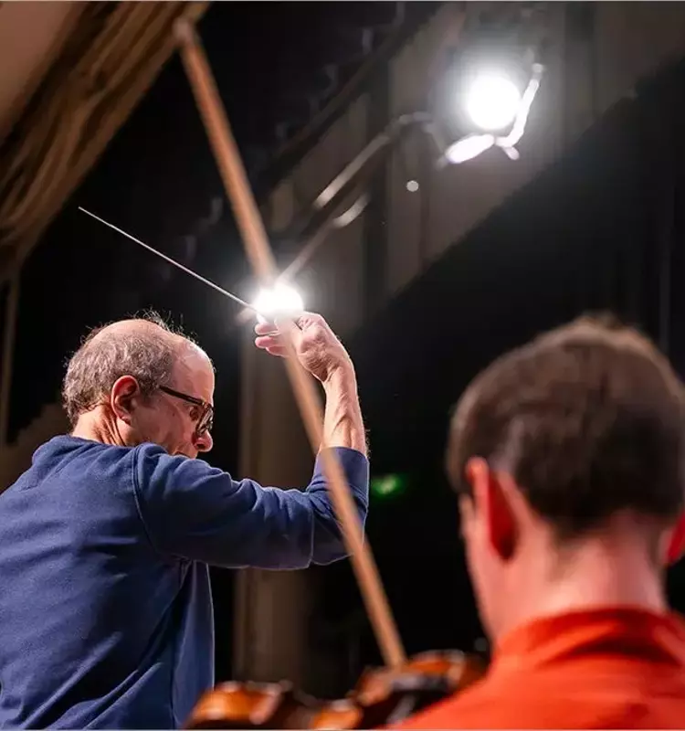 Conductor's Triumph: Adaptive Deep Brain Stimulation Revolutionizes Parkinson's Treatment