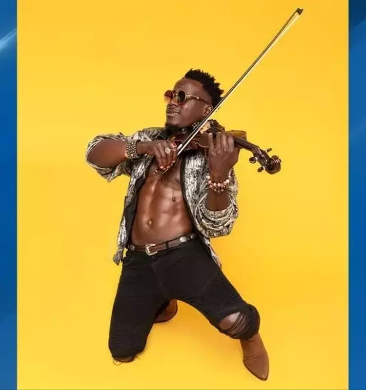 Experience the Symphony of Positivity with Demola's Vibrant Fusion Concert