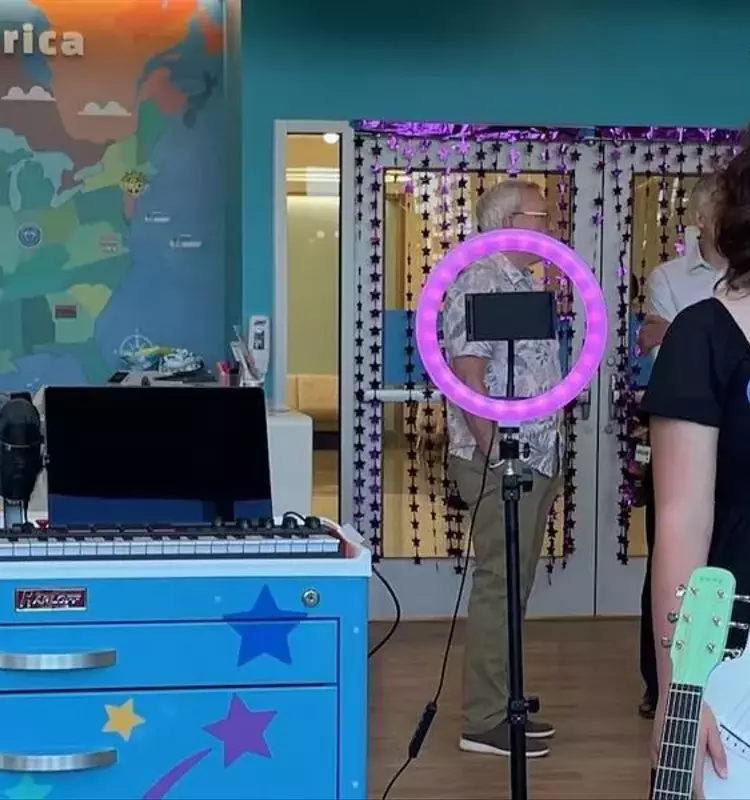 Young Music Enthusiast Gifts Therapeutic Cart to Pediatric Hospital