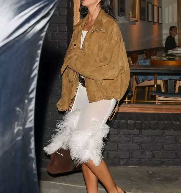Dua Lipa's Spring Fashion: A Transition from Summer Radiance