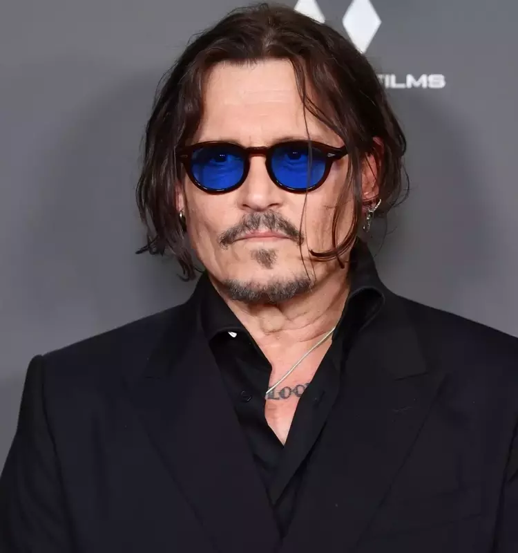 Johnny Depp Launches "Three Hearts Rum" with Unique Bottle Design