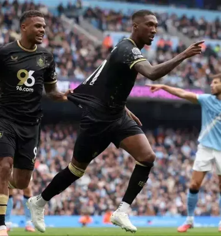Manchester City Dominates Burnley, Secures Top Spot in Premier League